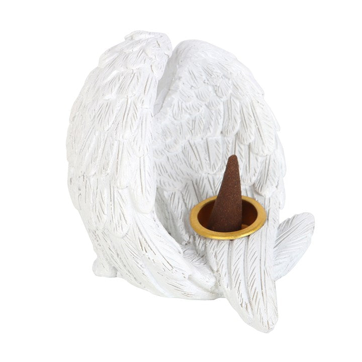 White ceramic fox-shaped incense holder with a brown cone on a white background