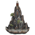 Bronze mountain-shaped resin backflow incense burner with cascading smoke effect