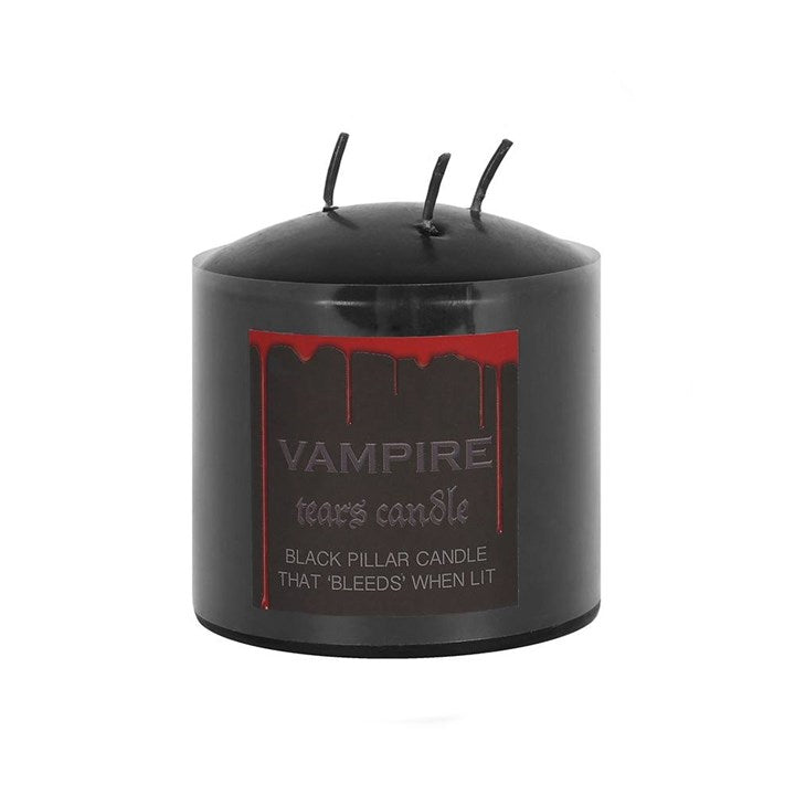 Black pillar candle with 'Vampire Tears' text and red design on a white background