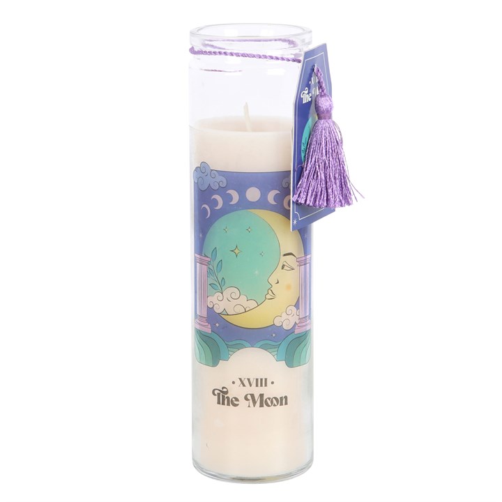 Candle with a decorative label featuring a moon design on a white background