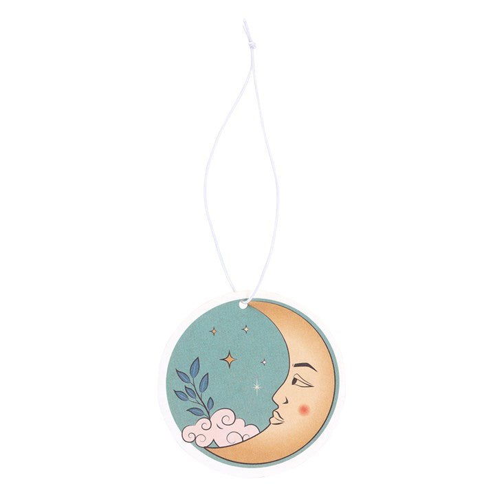 Decorative hanging moon and star design with a neutral background