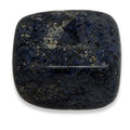 Square-shaped dark stone on a white background