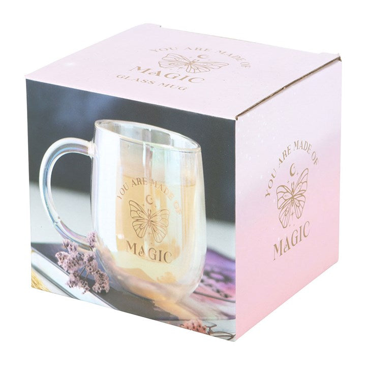 Iridescent mug with 'You are made of magic' text in a decorative box.