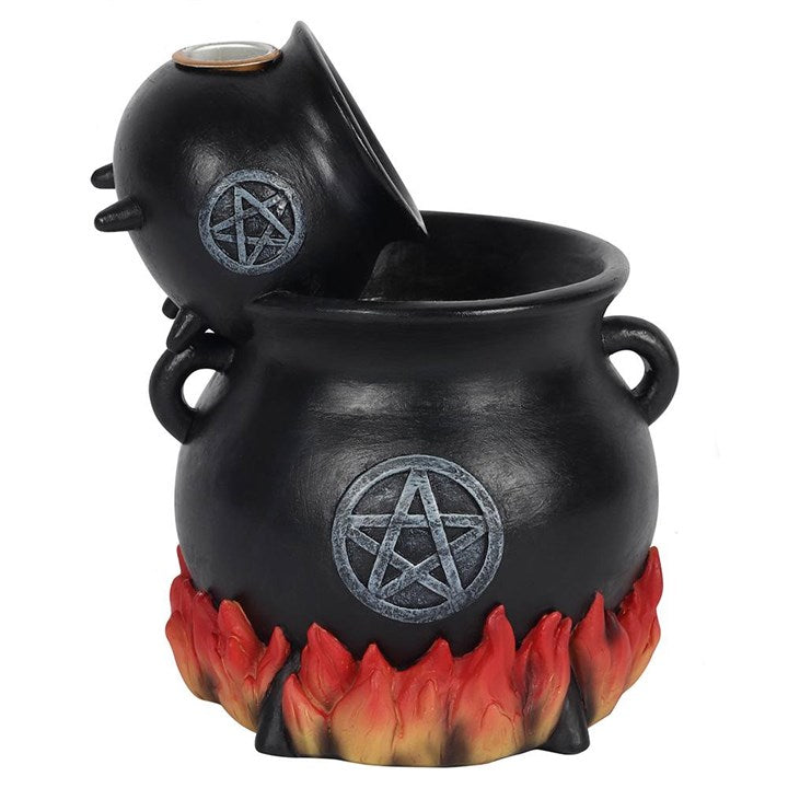 Black cauldron with pentacle design and flame-like base on a white background