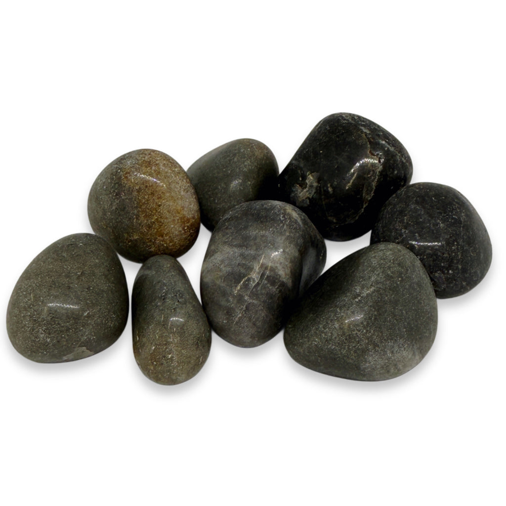 Set of dark gray stones on a white background