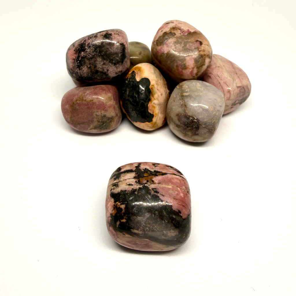 Rhodonite Tumblestone on a white background