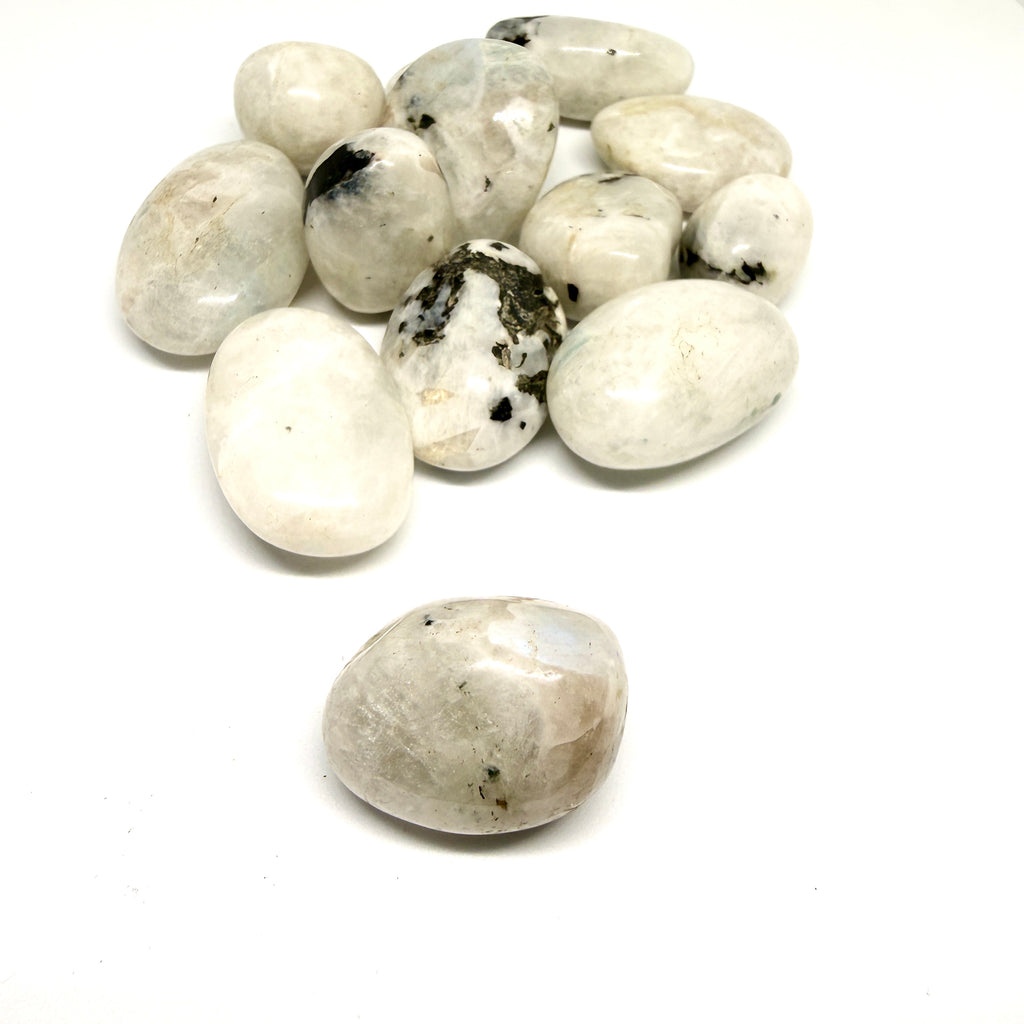Collection of white and gray stones on a white background