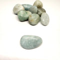 Greenish-gray stones on a white background
