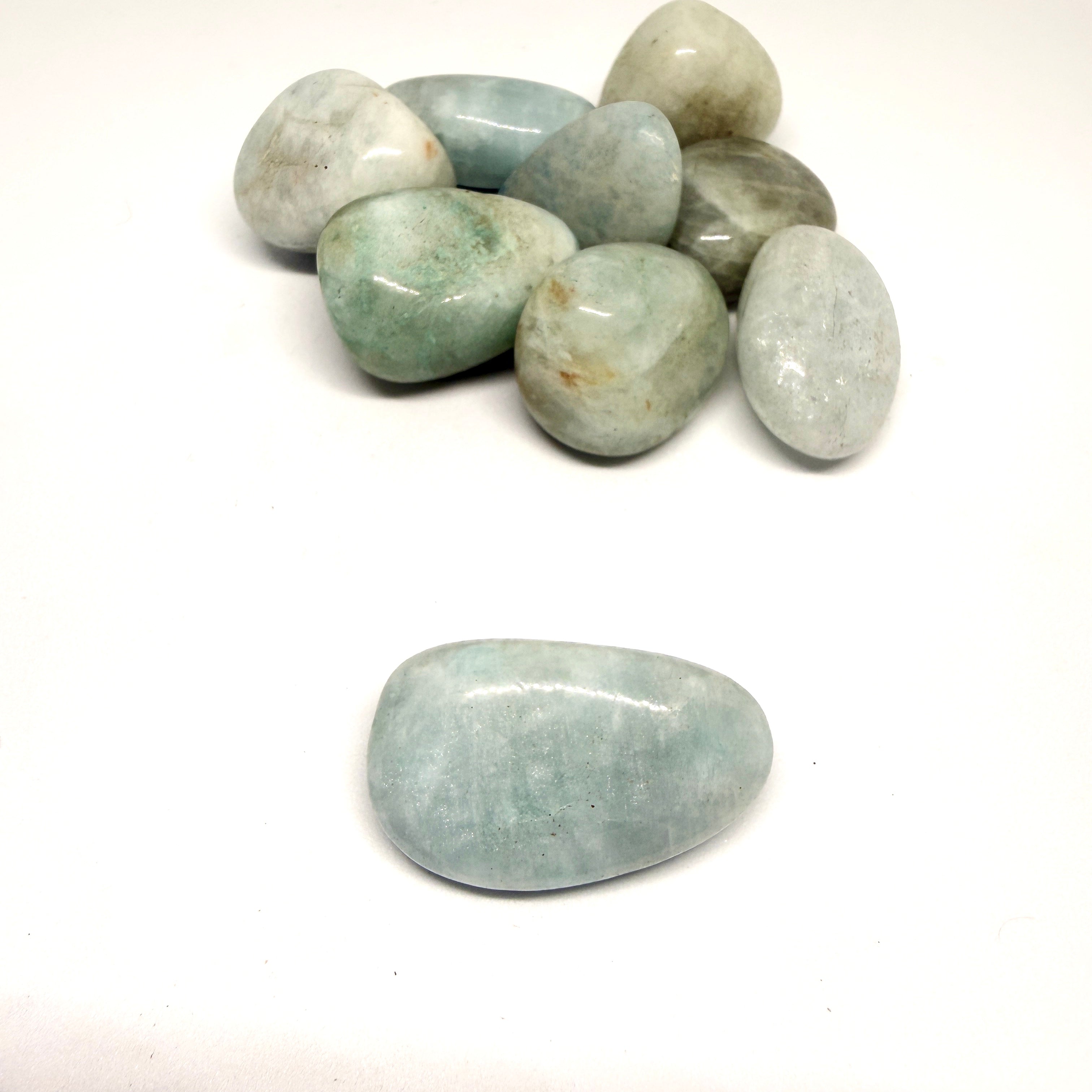 Greenish-gray stones on a white background