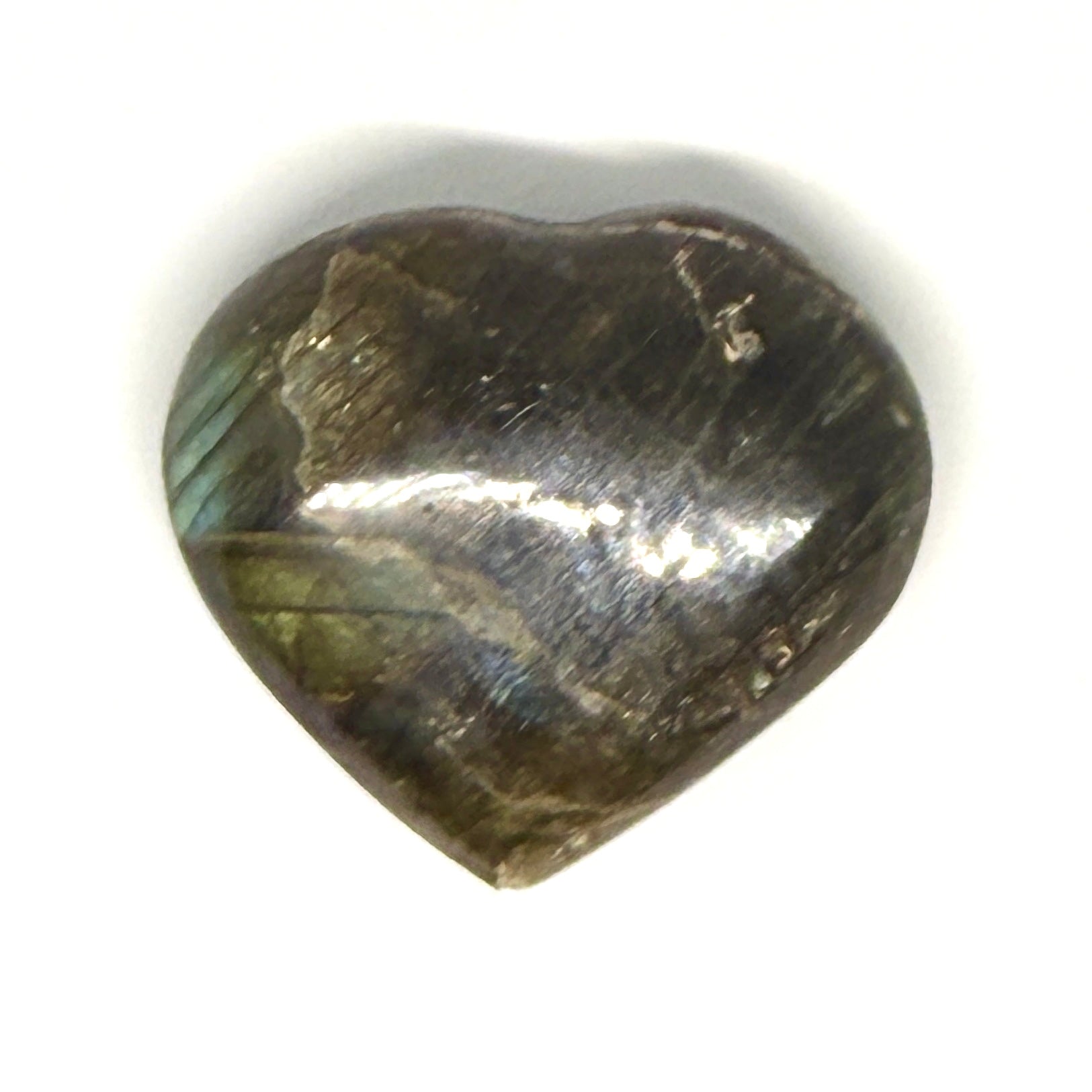Heart-shaped labradorite stone on a white background