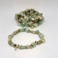 Bracelet made of small, multicolored stones on a white background