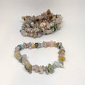Multicolored stone chip bracelet on a white background