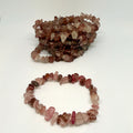 Two stone bead bracelets on a white background
