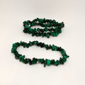 Two green stone necklaces on a white background