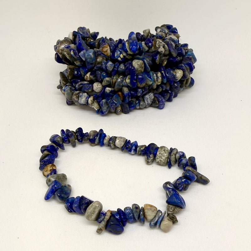 Two blue stone chip bracelets on a white background