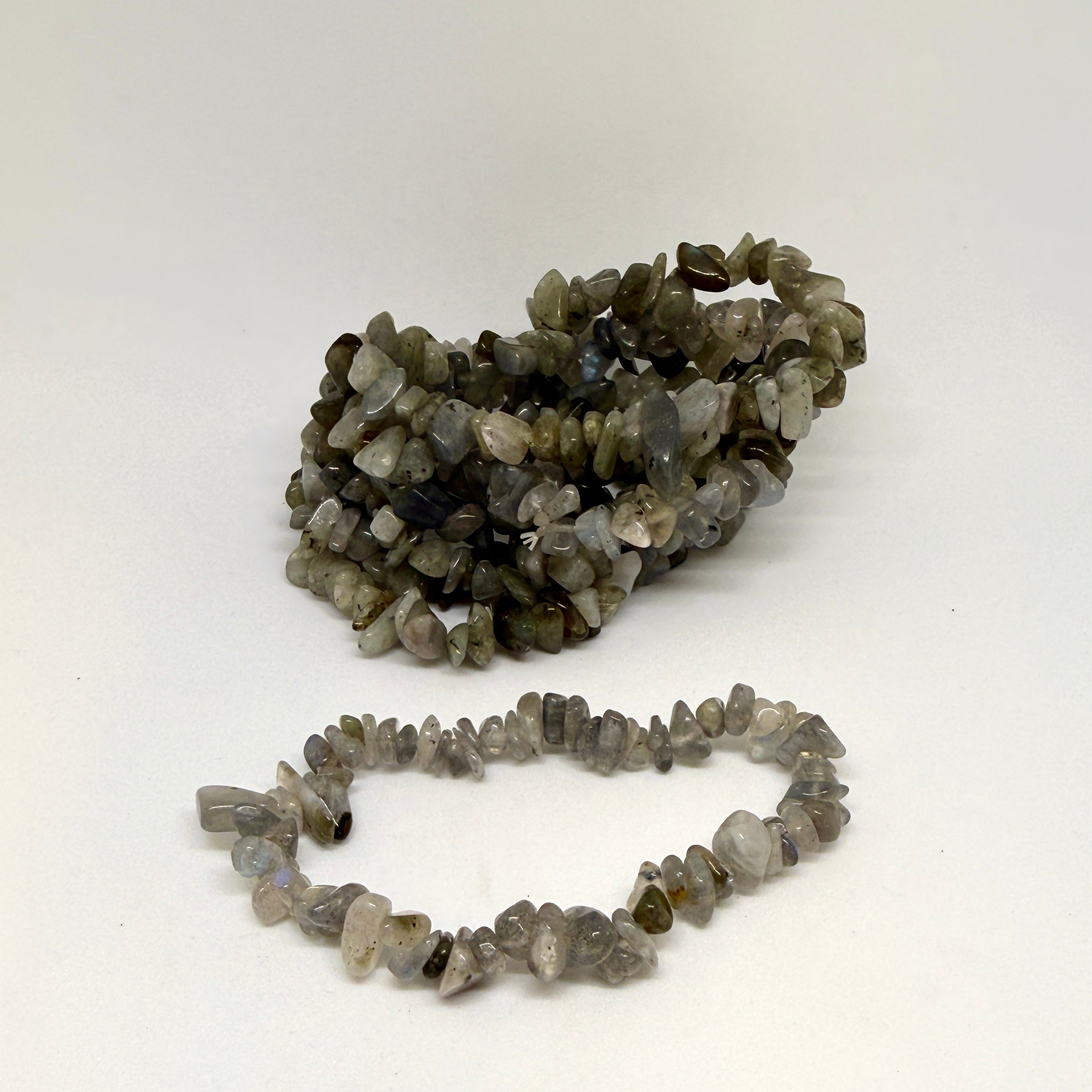 Two stone chip bracelets on a white background