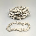 Two stone necklaces on a light gray background