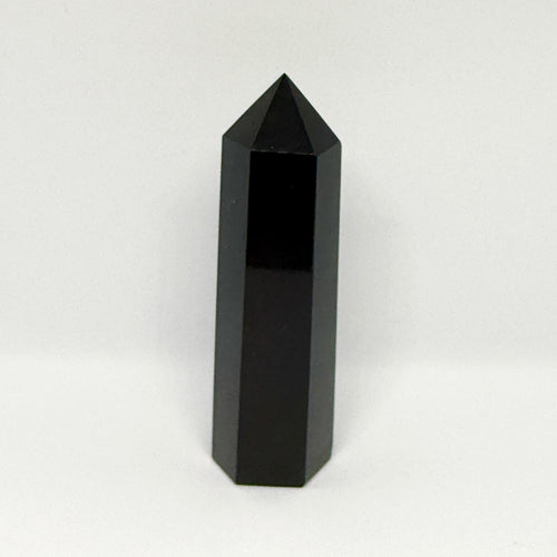 Black crystal tower on a white background