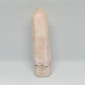 Pink crystal tower on a gray background