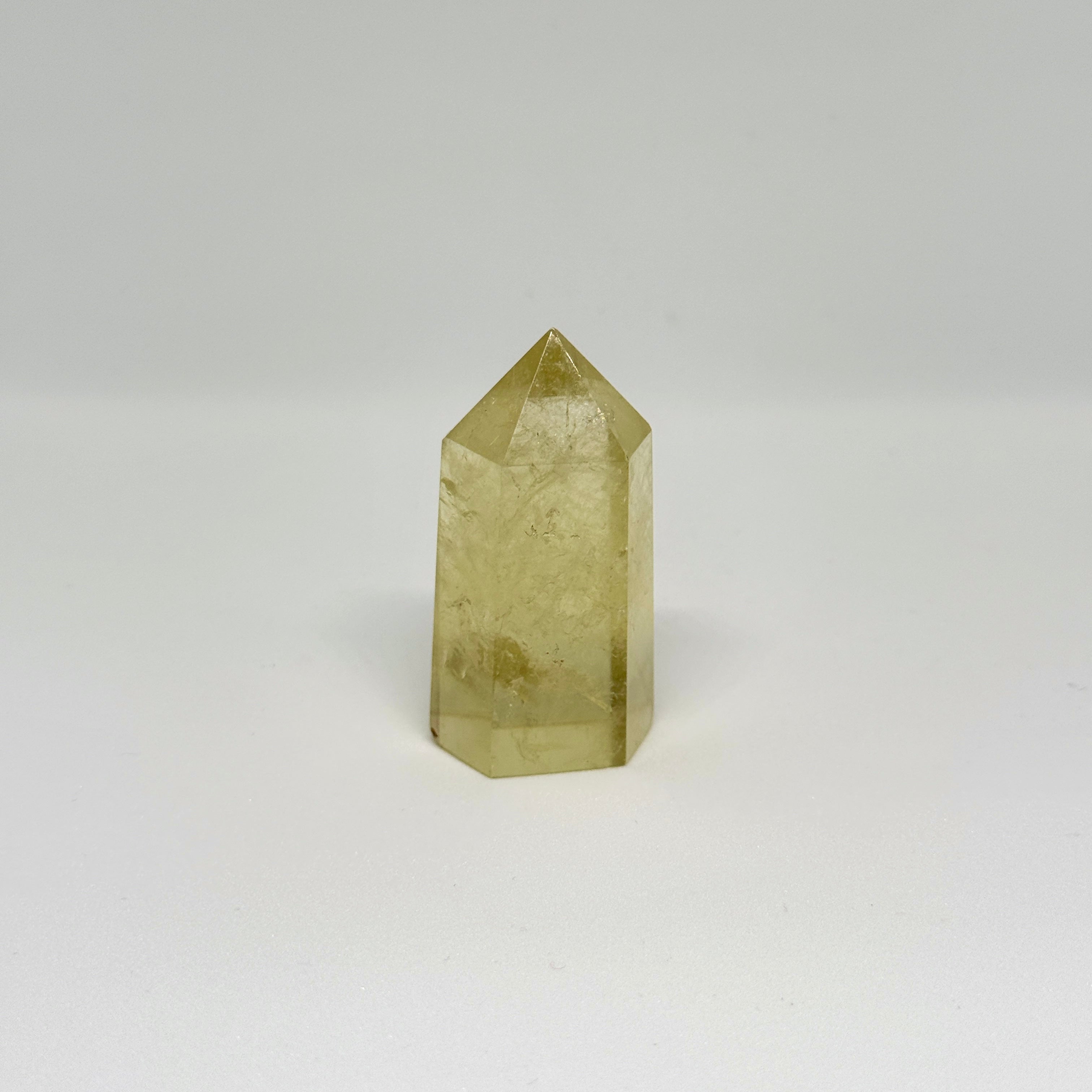 Crystal pyramid on a white background