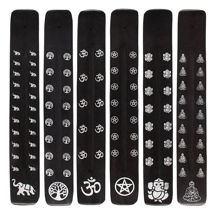 Set of black incense sticks with white symbols on a white background
