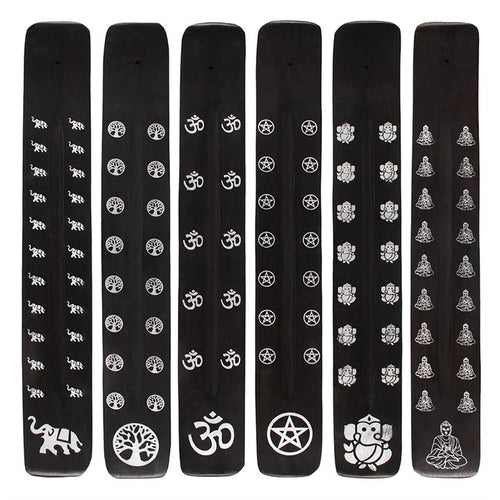 Set of black incense sticks with white symbols on a white background