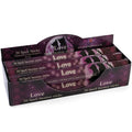 Display of 'Love' spell incense sticks packaging with purple and black design.