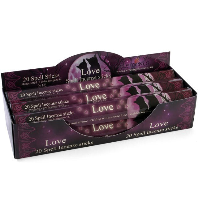 Display of 'Love' spell incense sticks packaging with purple and black design.