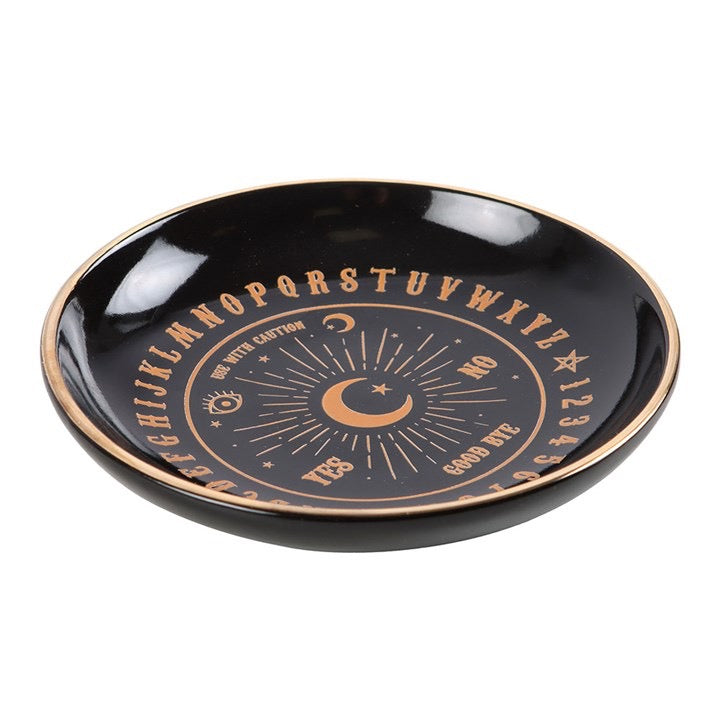 Black and gold ceramic trinket dish — side view showing size and depth