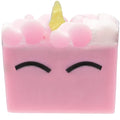 Pink soap bar with a yellow unicorn horn on a white background
