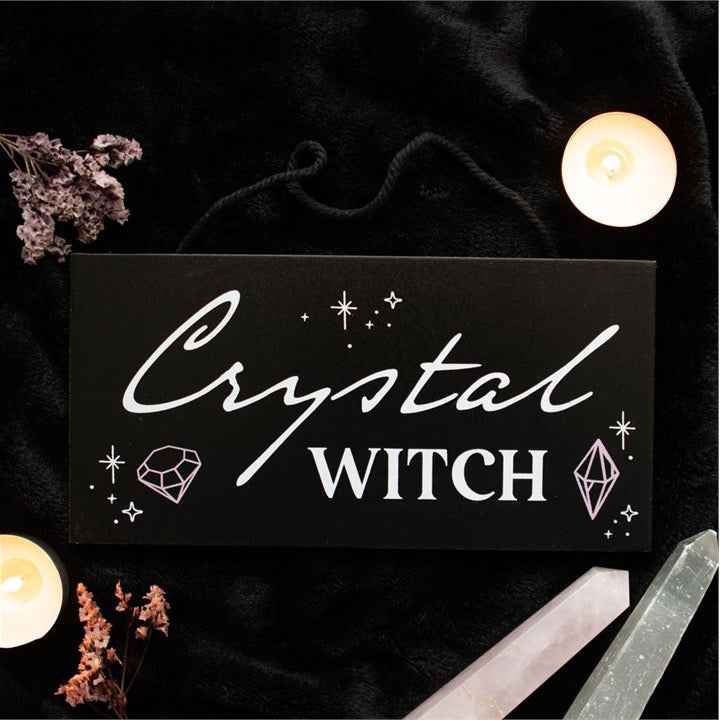 Crystal Witch hanging sign displayed in witchy home decor setting