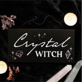 Crystal Witch hanging sign displayed in witchy home decor setting