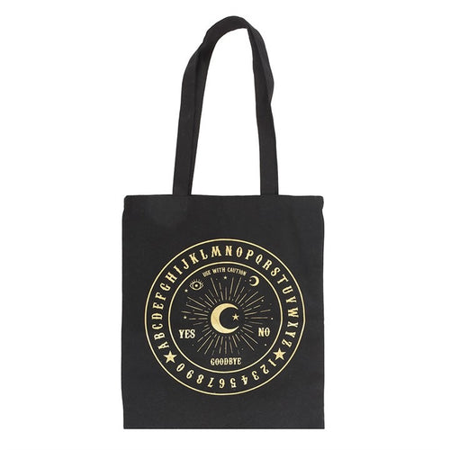 Black tote bag with gold Ouija board design on a white background