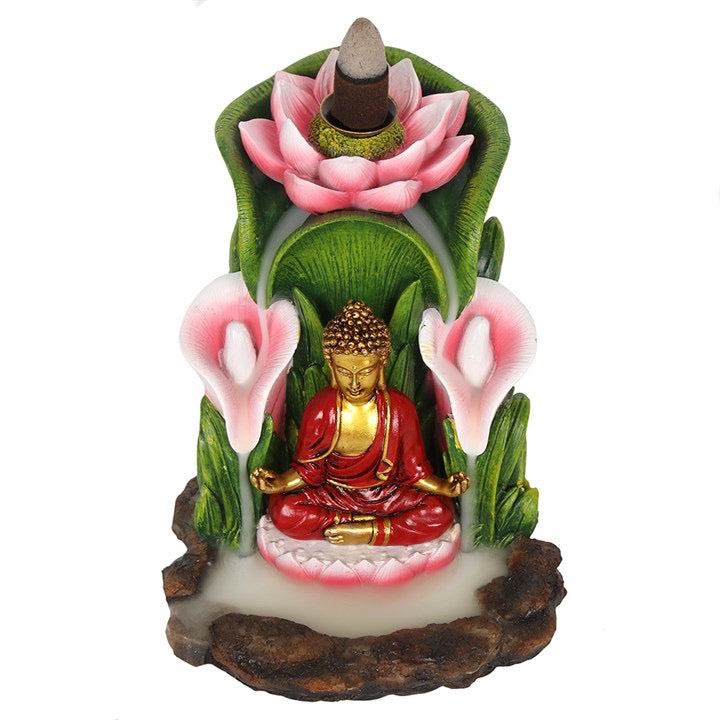 Decorative figurine of a Buddha statue with pink lotus flowers on a white background