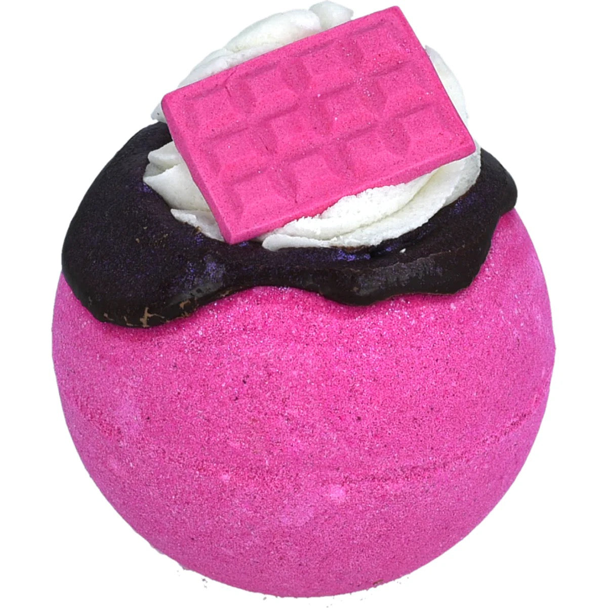 Pink bath bomb with a bar of soap and goggles on top against a white background