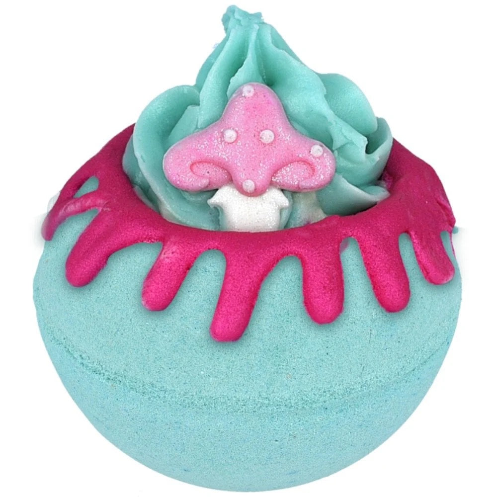 Colorful bath bomb with a mushroom design on a white background