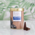 Backflow Incense Cones Nag Champa packaging with cones on a light background