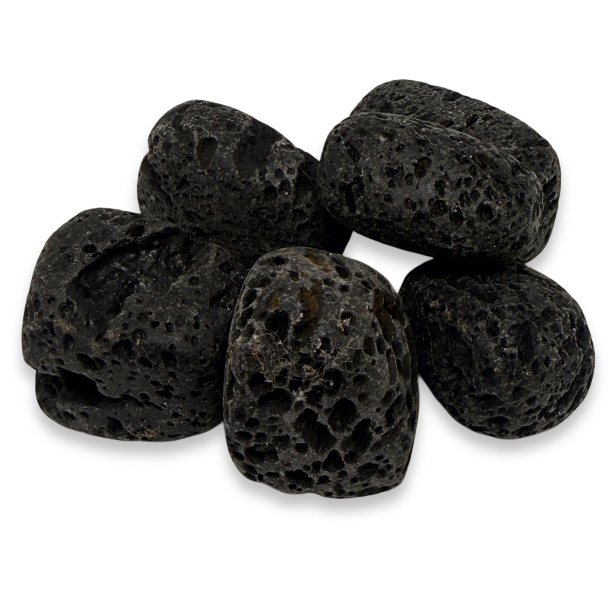 Black volcanic pebbles on a white background
