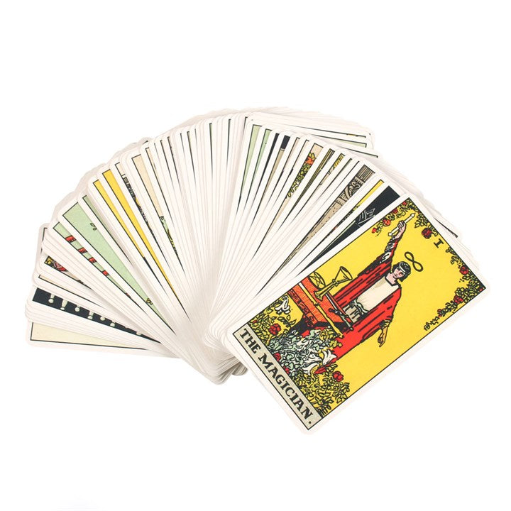 Fanned tarot cards with 'The Magician' card prominently displayed on a white background