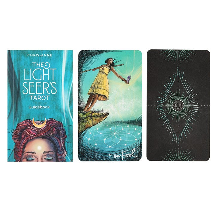 The Light Seer's Tarot guidebook and tarot card with a woman in a yellow dress on a white background