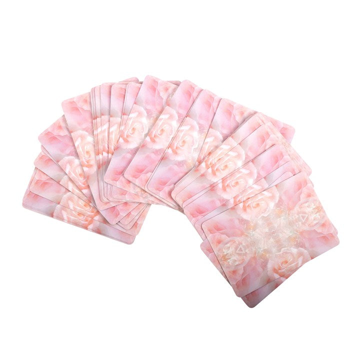 Set of pink floral cards fanned out on a white background