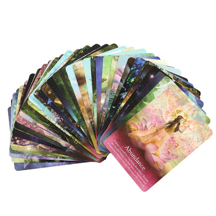 Set of colorful tarot cards with a focus on one card titled 'Abundance'.