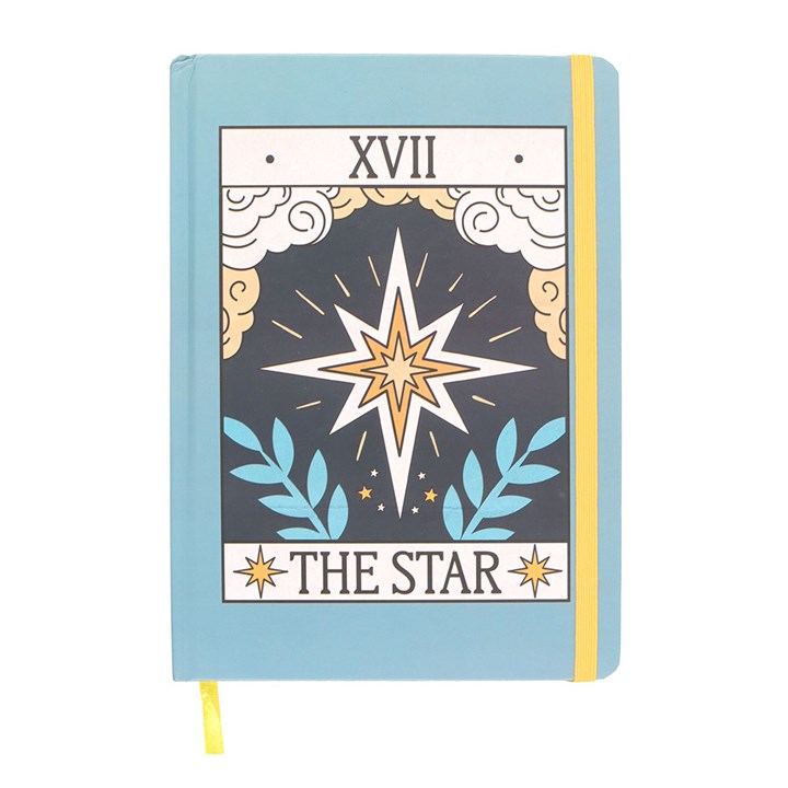 Notebook with 'The Star' tarot card design on a light blue cover