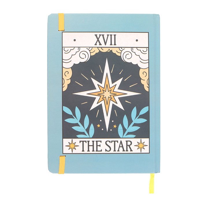 Notebook with star design and 'The Star' tarot card text on a light blue background