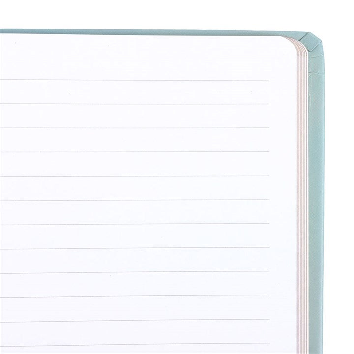 Notebook with lined pages and a metallic edge on a white background