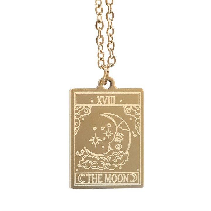 Gold necklace with 'The Moon' tarot card pendant on a white background