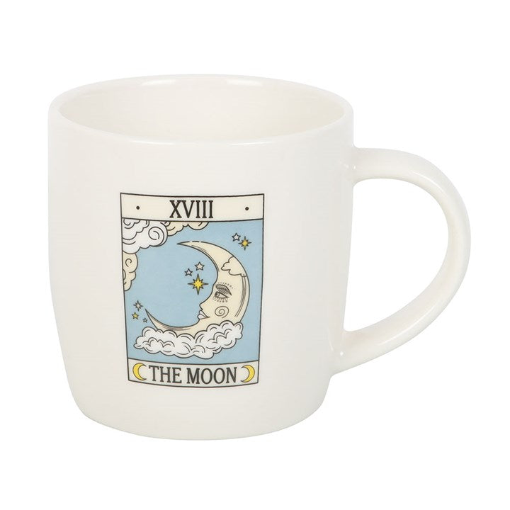 White mug with 'The Moon' tarot card design on a white background