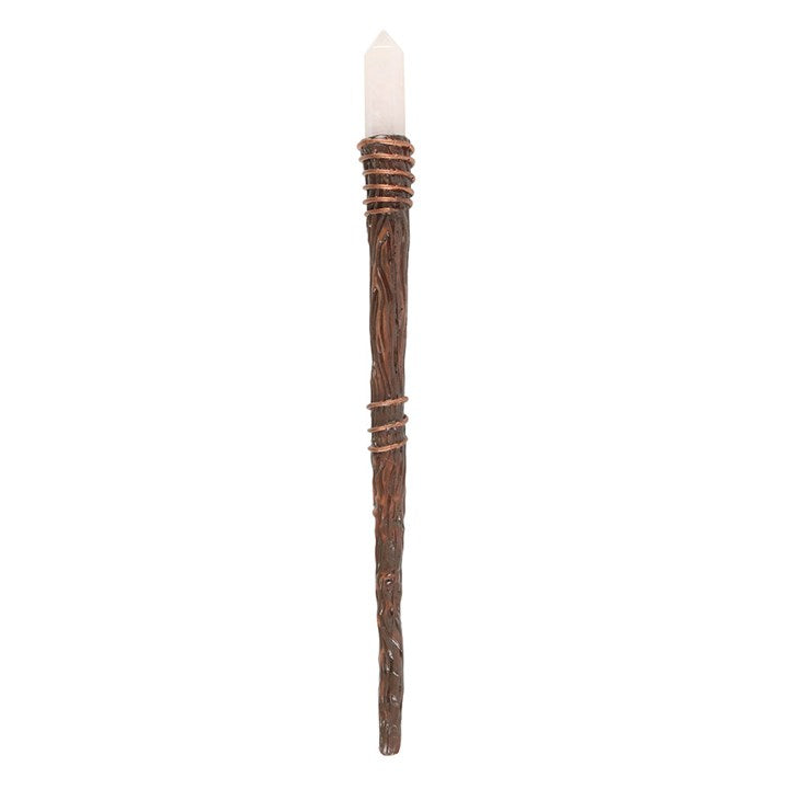 Tall candle with wooden holder on a white background