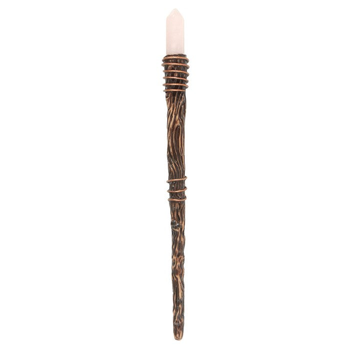 Decorative candle with wicker-like design on a white background