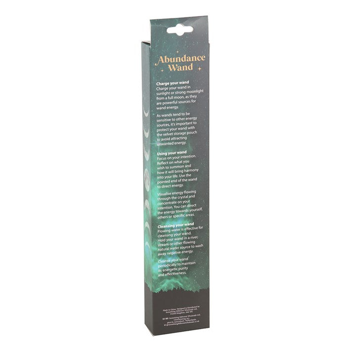 Packaging of an abundance wand with text on a white background